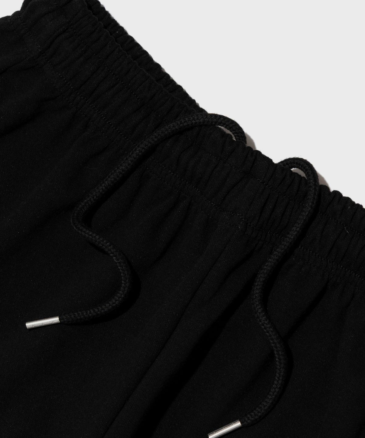 카고브로스(CARGOBROS) 레터링 세미 와이드 스웨트 팬츠 (블랙)