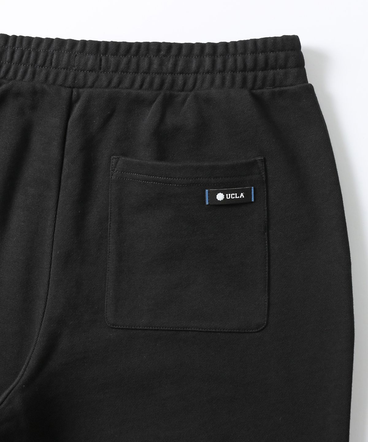 유씨엘에이(UCLA) 남녀공용 데일리 스몰로고 져지와이드 풋루즈 팬츠[BLACK](UB9LP29_39)