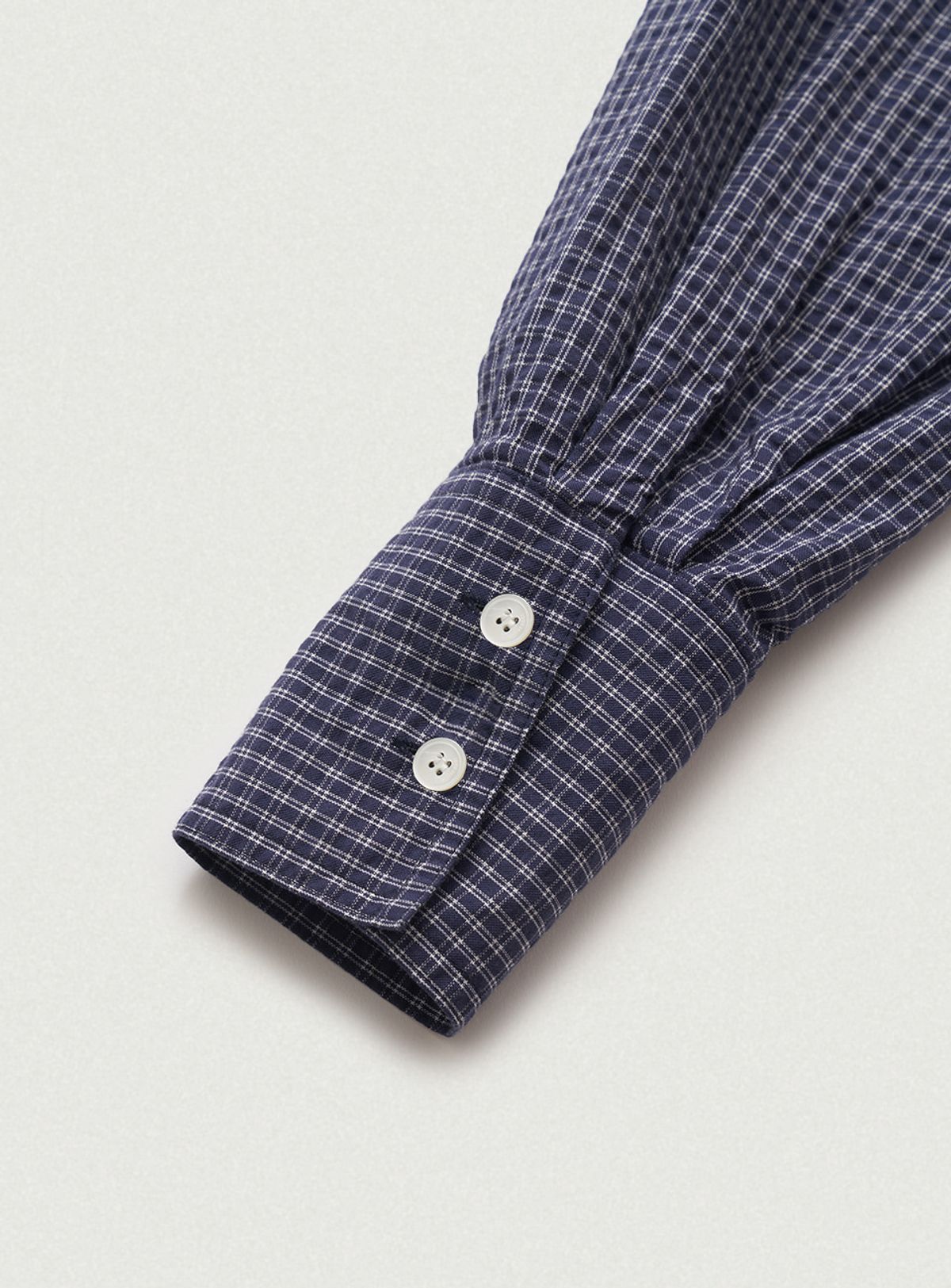 더바넷(THEBARNNET) Linea Cropped Blouse_Navy
