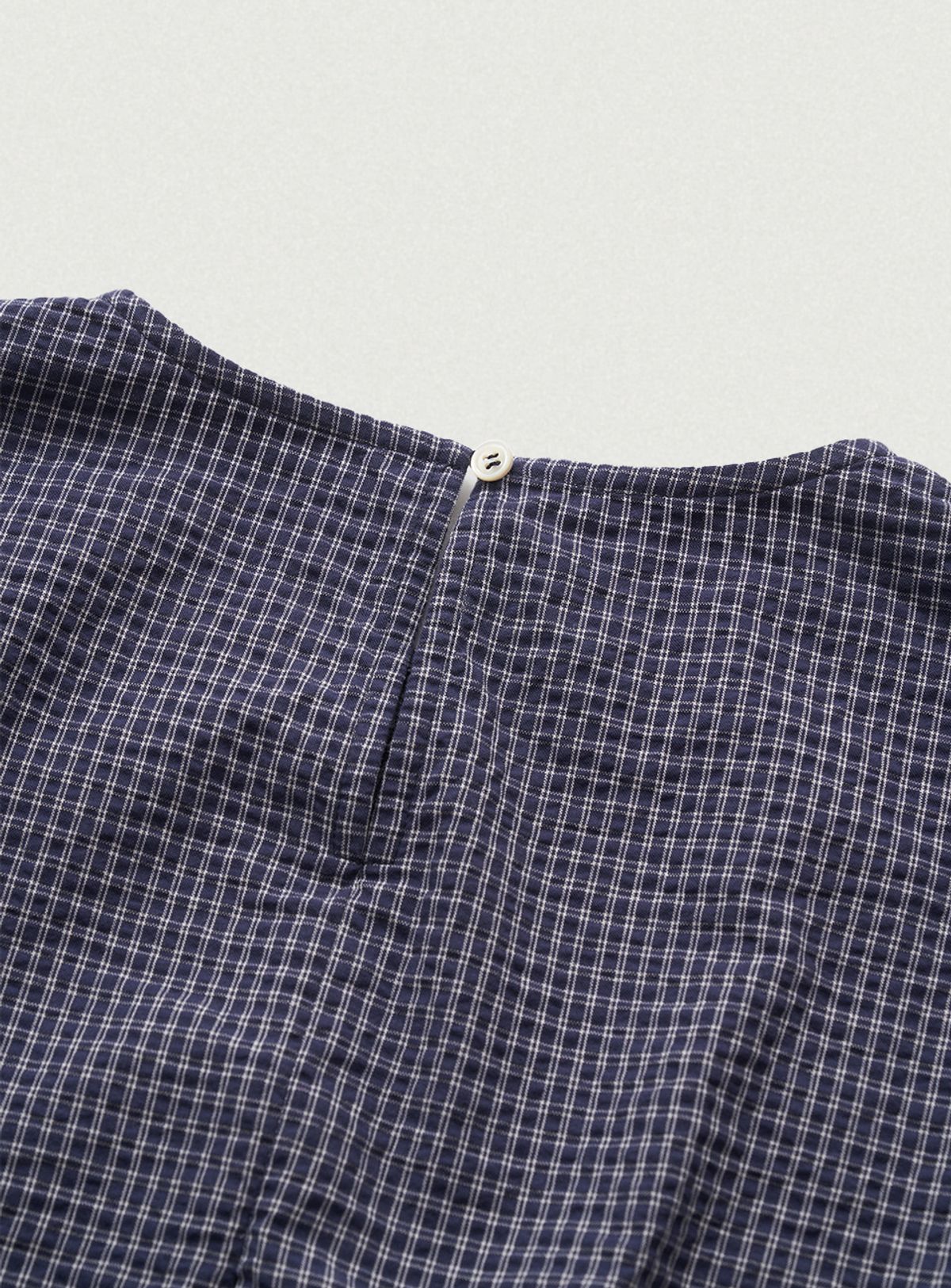 더바넷(THEBARNNET) Linea Cropped Blouse_Navy