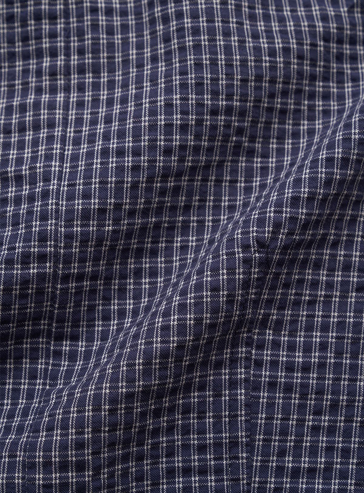 더바넷(THEBARNNET) Linea Cropped Blouse_Navy