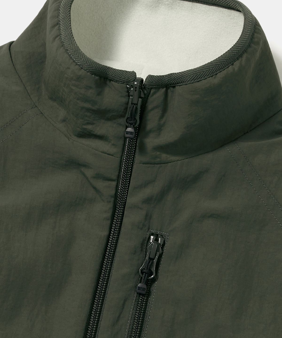 컬럼비아 유니버시티(COLUMBIA UNIVERSITY) TRAJAN LABEL REVERSIBLE NYLON/PP VEST_KHAKI