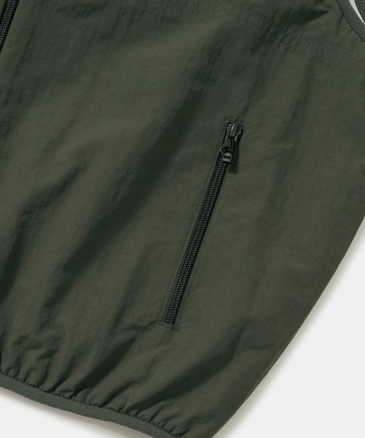 컬럼비아 유니버시티(COLUMBIA UNIVERSITY) TRAJAN LABEL REVERSIBLE NYLON/PP VEST_KHAKI
