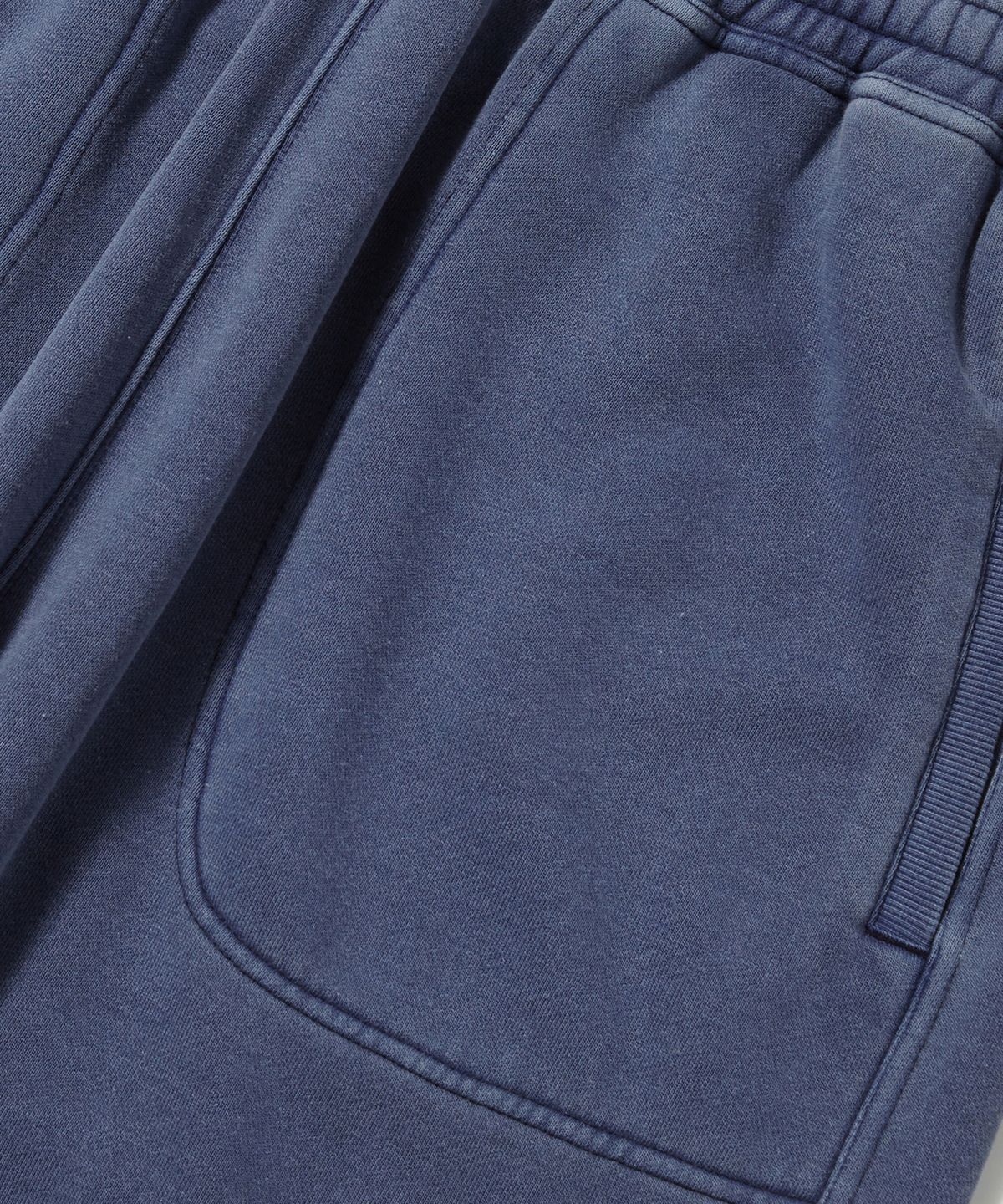 컬럼비아 유니버시티(COLUMBIA UNIVERSITY) NY STREET TAIL LOOSE-FIT DYEING FLEECE SWEATPANTS_NAVY