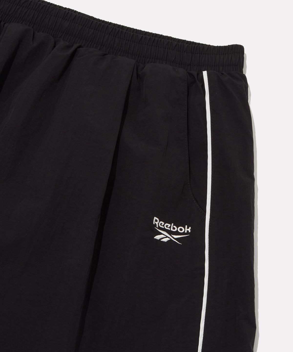 리복(REEBOK) 플로우 우븐 스커트 (W) - 블랙