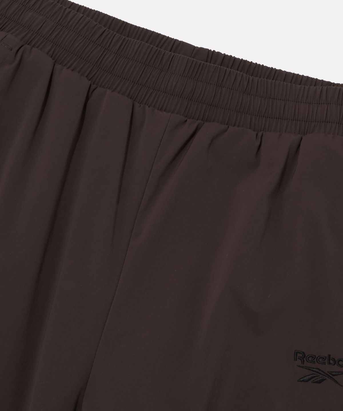 리복(REEBOK) 플로우 팬츠 (W) - 다크브라운