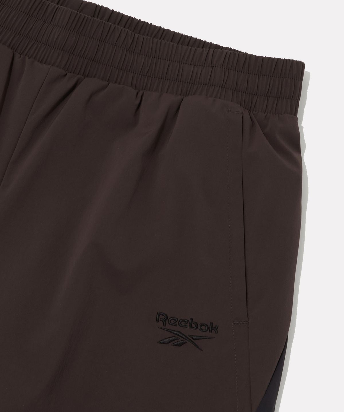 리복(REEBOK) 플로우 팬츠 (W) - 다크브라운