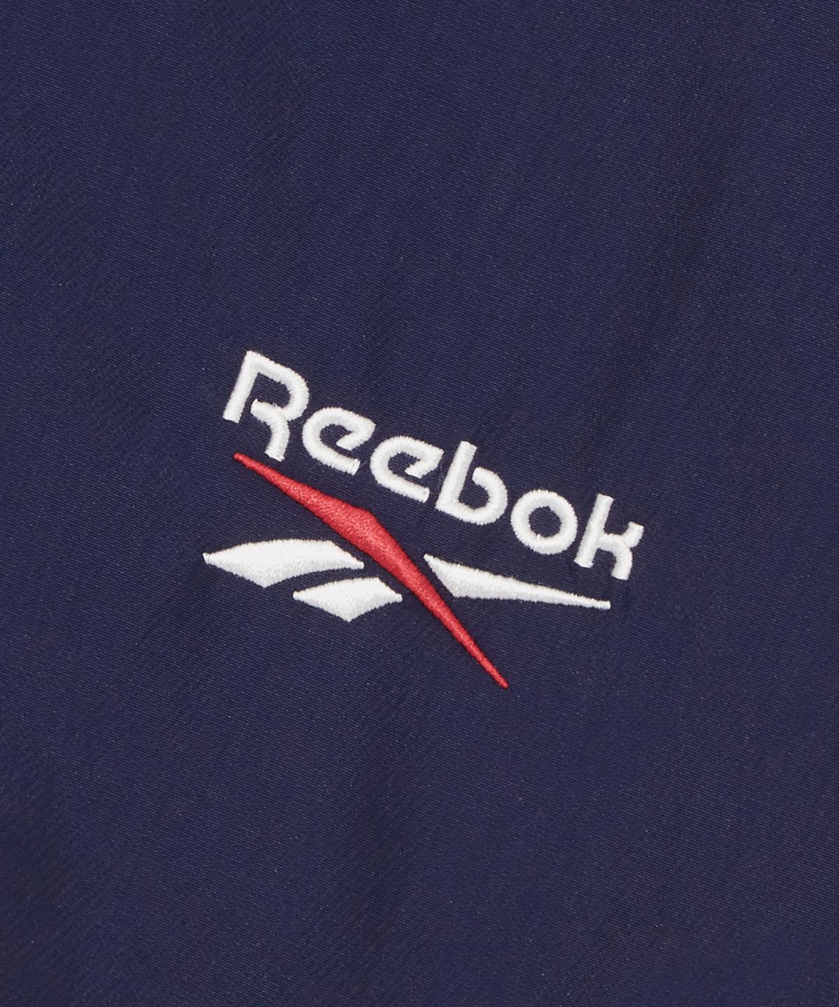 리복(REEBOK) 뉴 DNA 윈드 브레이커 - 다크네이비