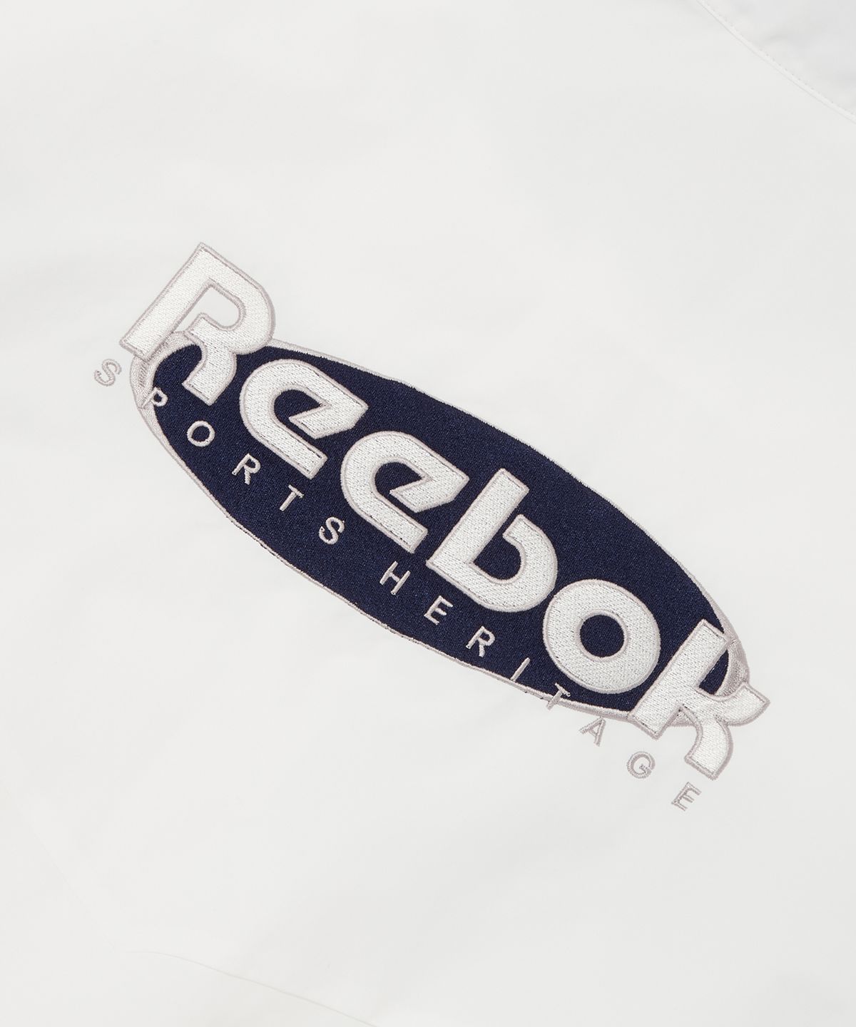 리복(REEBOK) 헤리티지 윈드 브레이커 (W) - 오프화이트