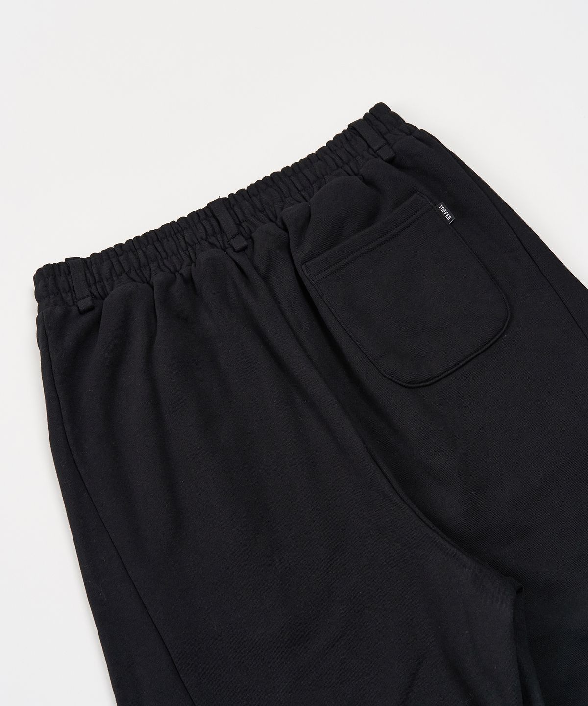 토피(TOFFEE) 인시전 벌룬핏 스웻 팬츠 (BLACK)