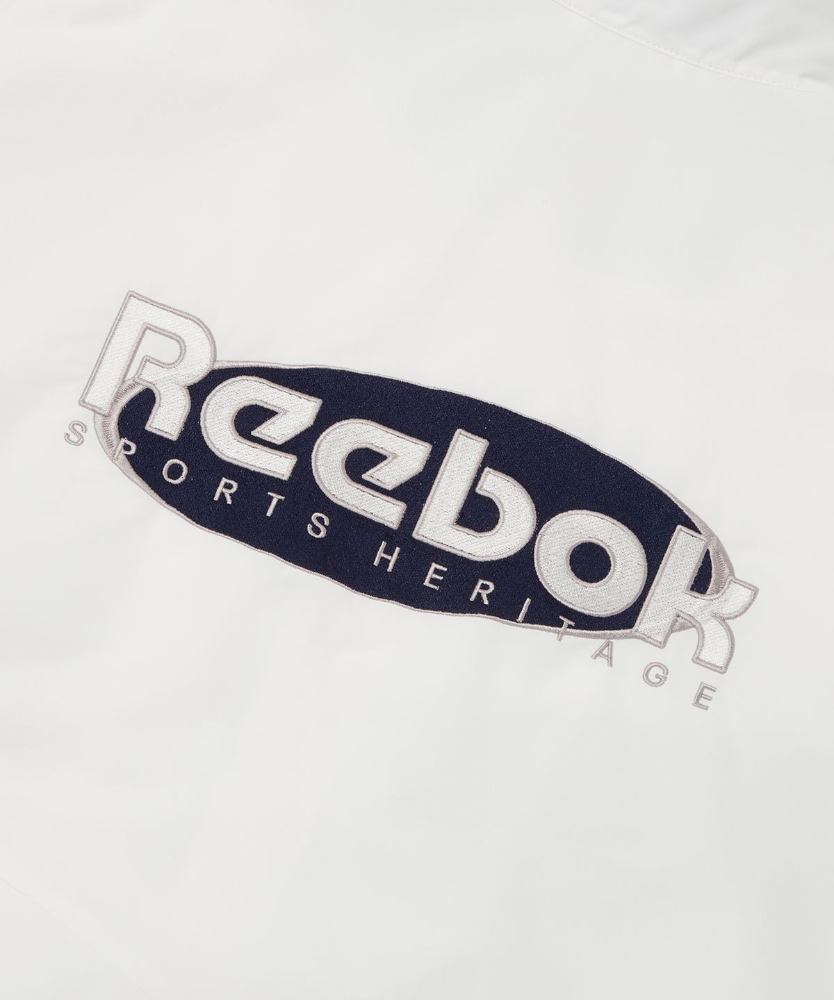 리복(REEBOK) 헤리티지 윈드 브레이커 - 오프화이트