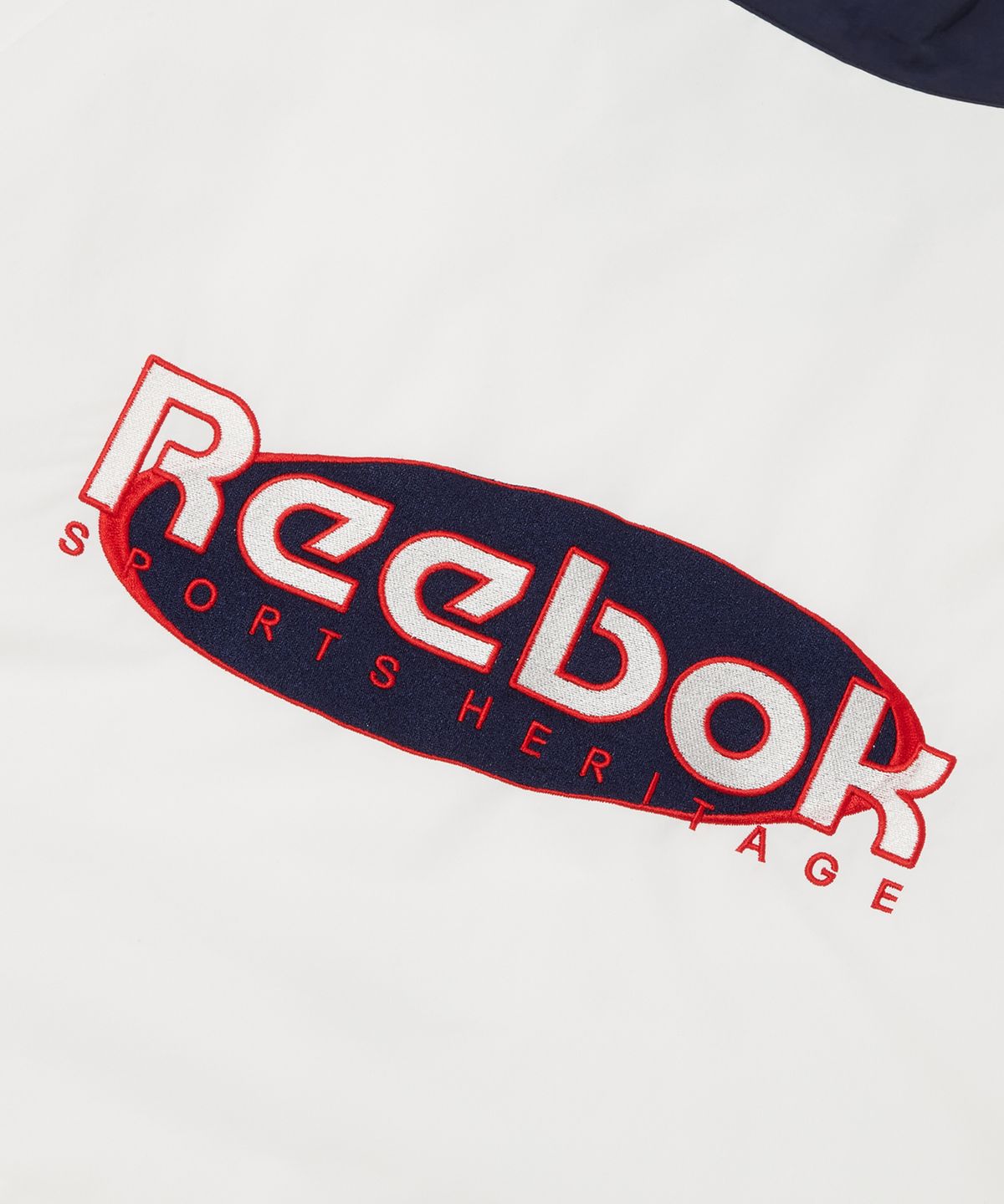 리복(REEBOK) 헤리티지 아노락 자켓 - 오프화이트