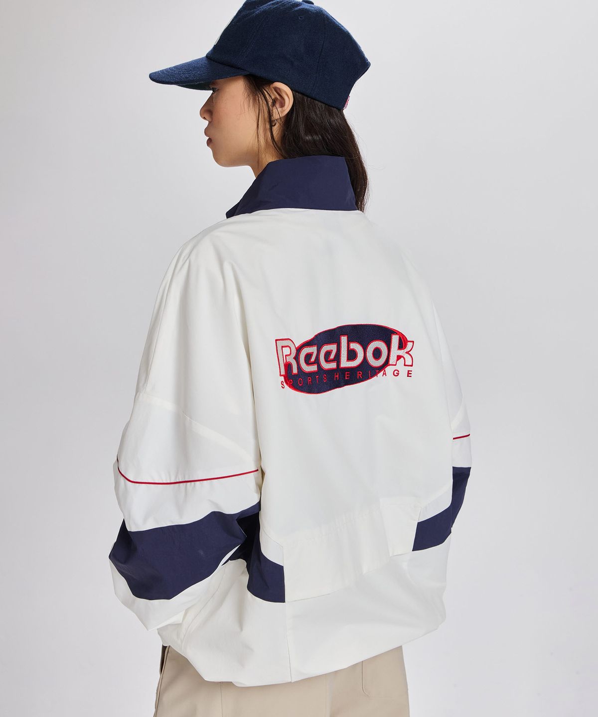 리복(REEBOK) 헤리티지 아노락 자켓 - 오프화이트