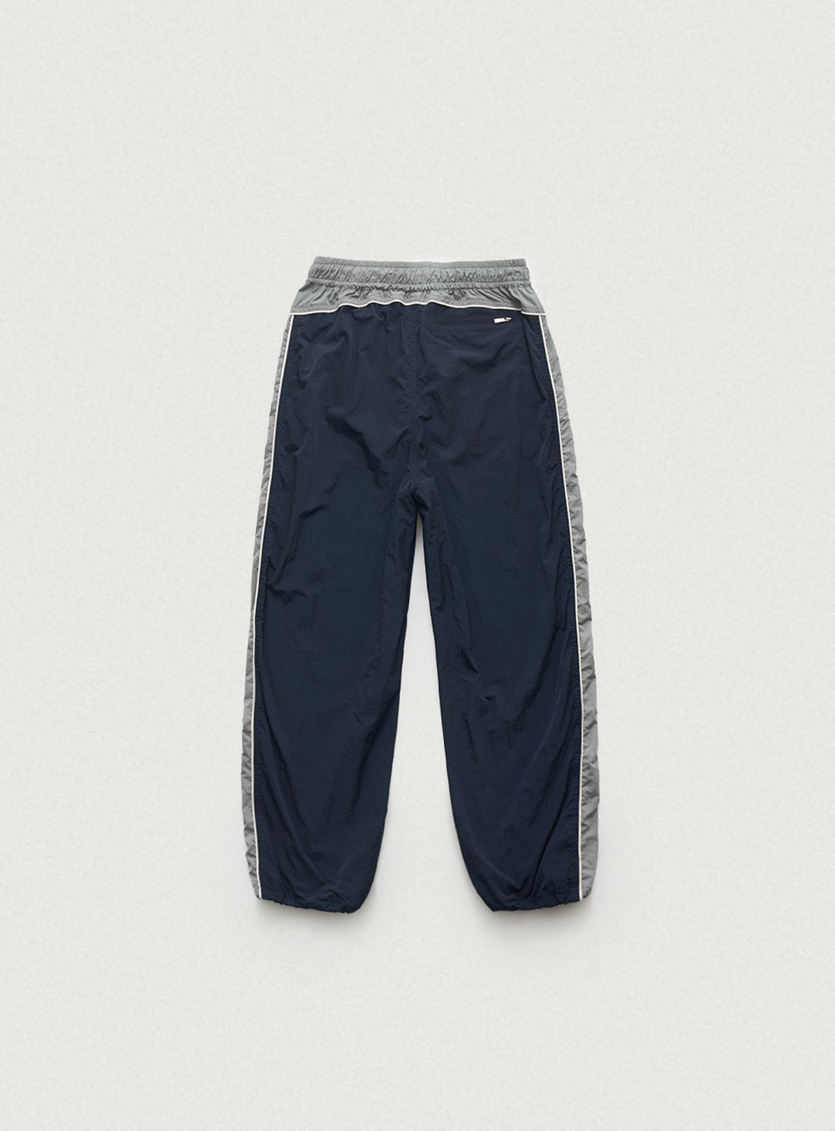 더바넷(THEBARNNET) Tovi Wind Set-Up Pants_Navy