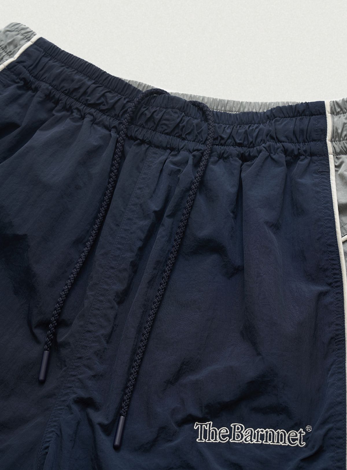 더바넷(THEBARNNET) Tovi Wind Set-Up Pants_Navy
