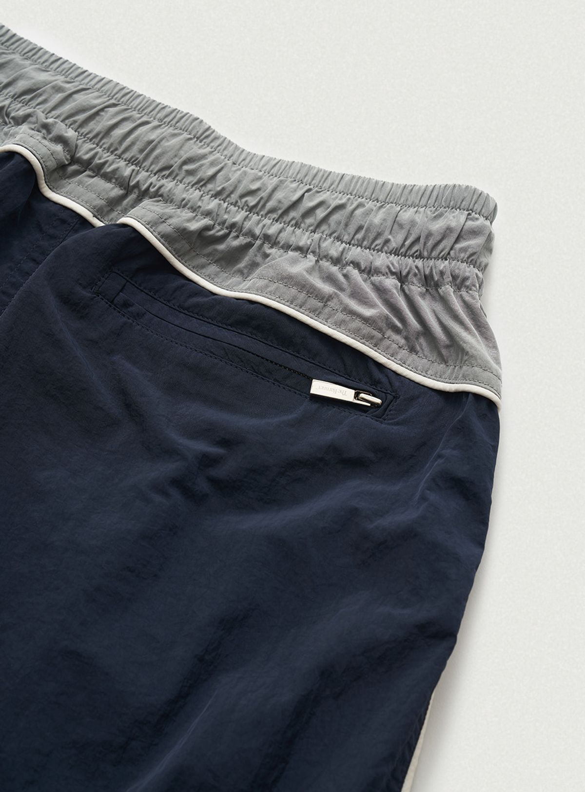 더바넷(THEBARNNET) Tovi Wind Set-Up Pants_Navy