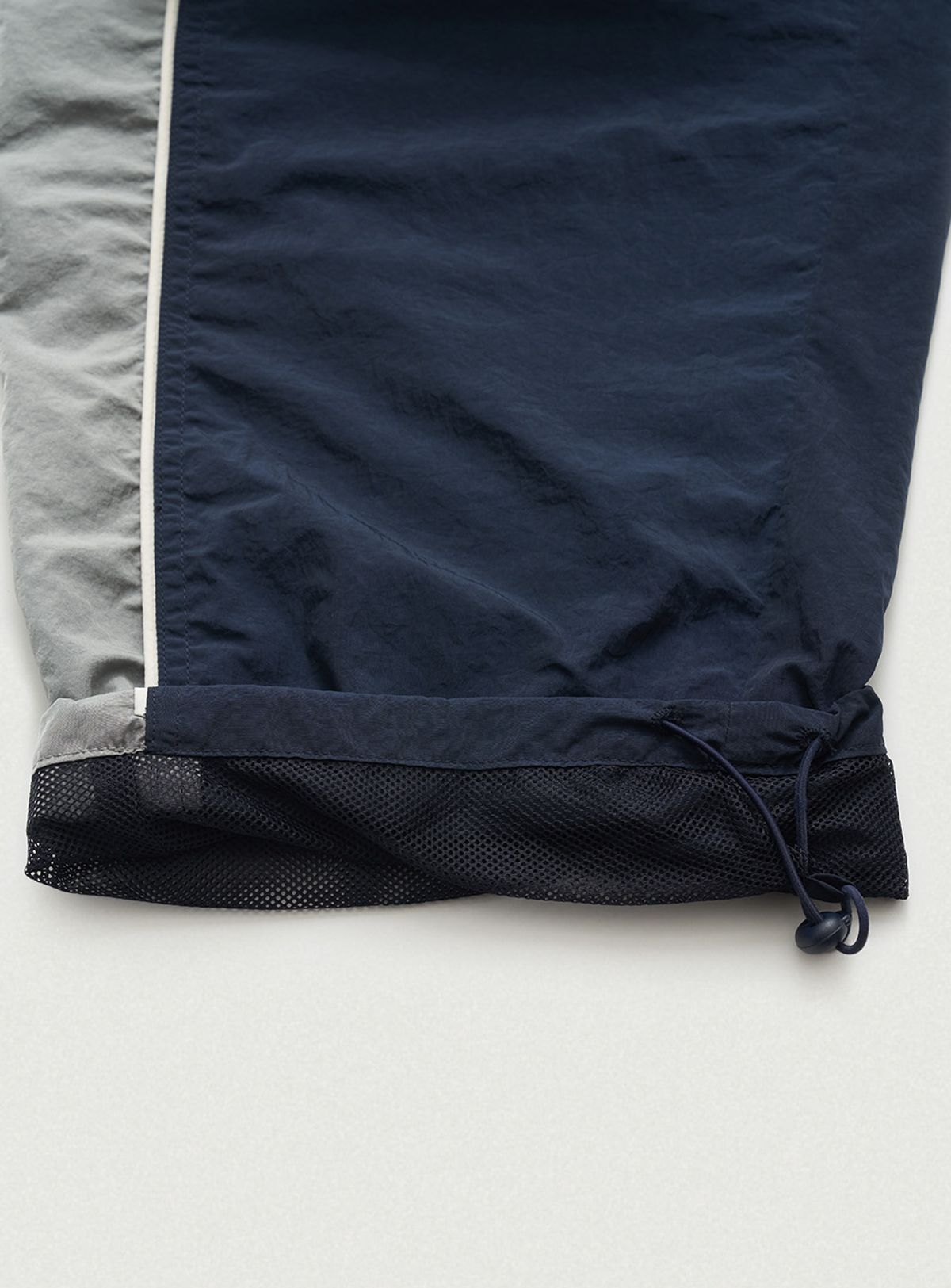 더바넷(THEBARNNET) Tovi Wind Set-Up Pants_Navy