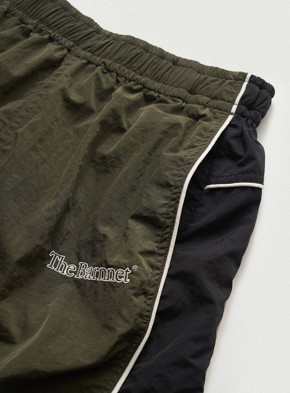 더바넷(THEBARNNET) Tovi Wind Set-Up Pants_Khaki