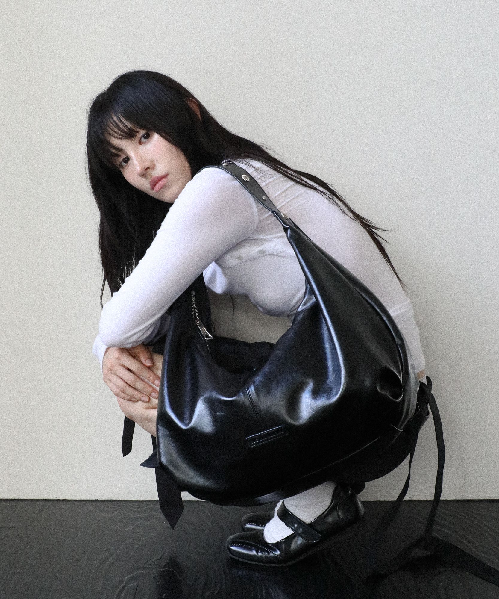 MUSINSA | IUGAMAKARAS Studded Strap Hobo Bag (Black)