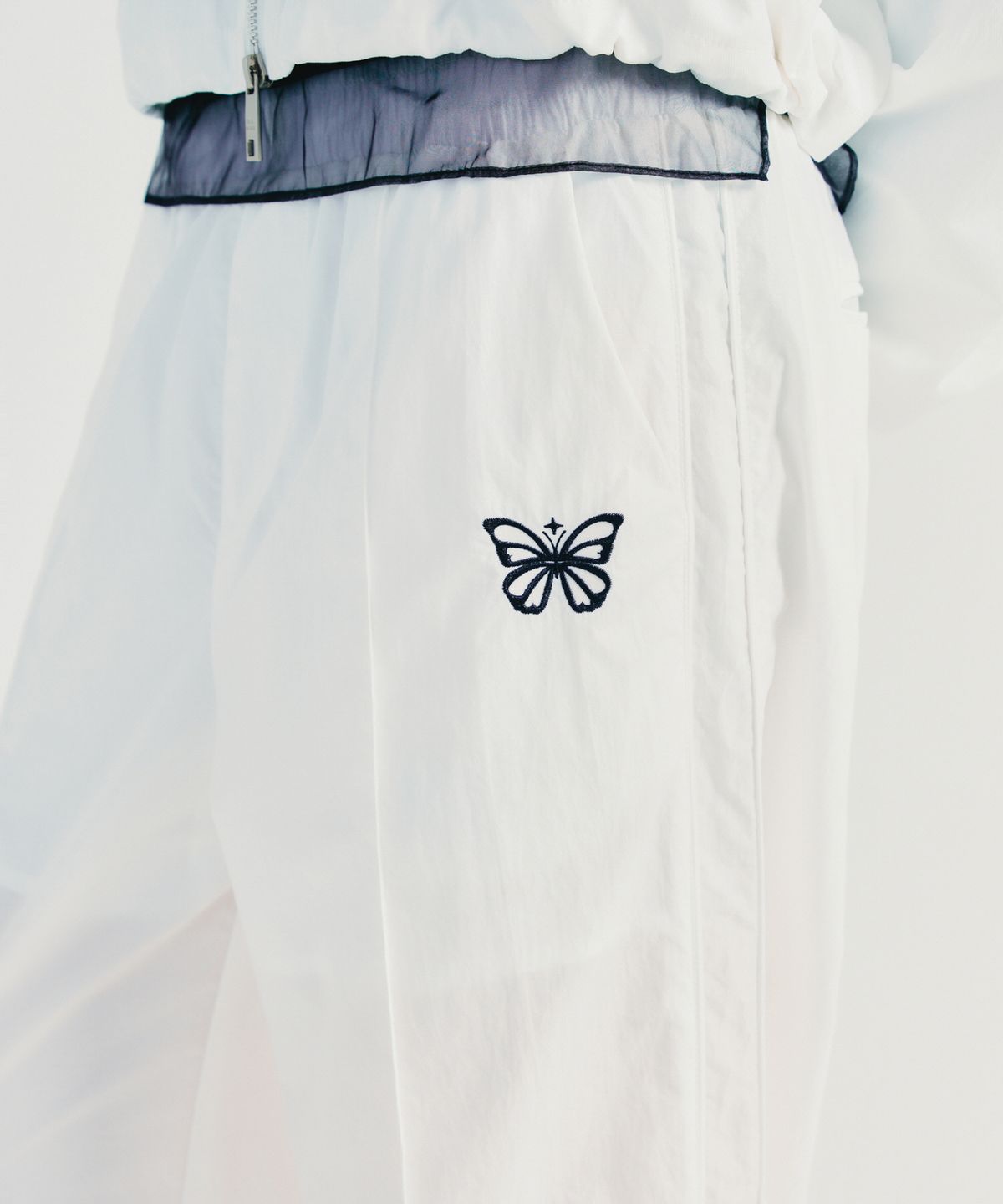닉앤니콜(NICK&NICOLE) UTILITY GROOVY TRACKSUIT PANTS_IVORY