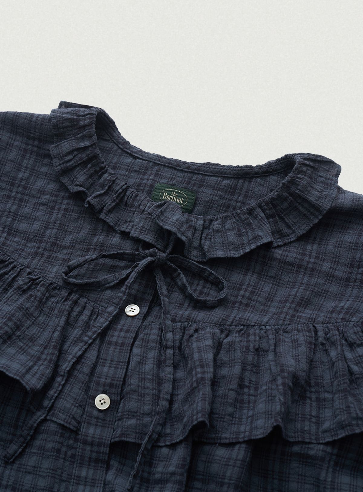 더바넷(THEBARNNET) Panele Check Ruffled Blouse_Navy