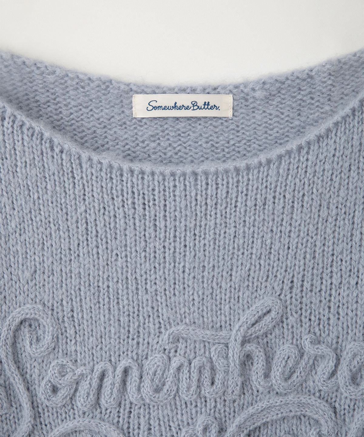 썸웨어버터(SOMEWHEREBUTTER) Mohair Letter Long Sleeve Knit - Light Blue