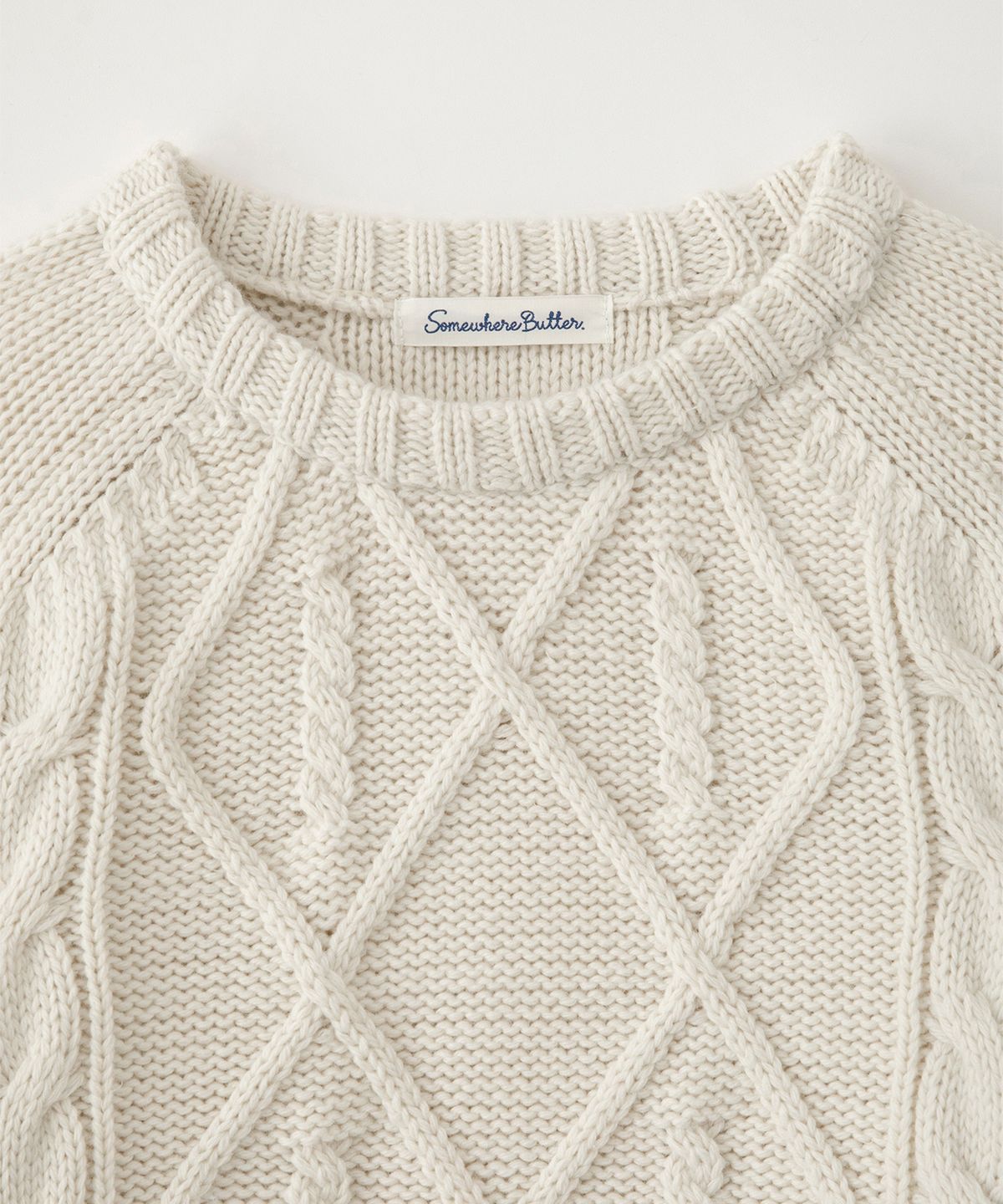 썸웨어버터(SOMEWHEREBUTTER) Posy Cable Wool Knit - Ivory