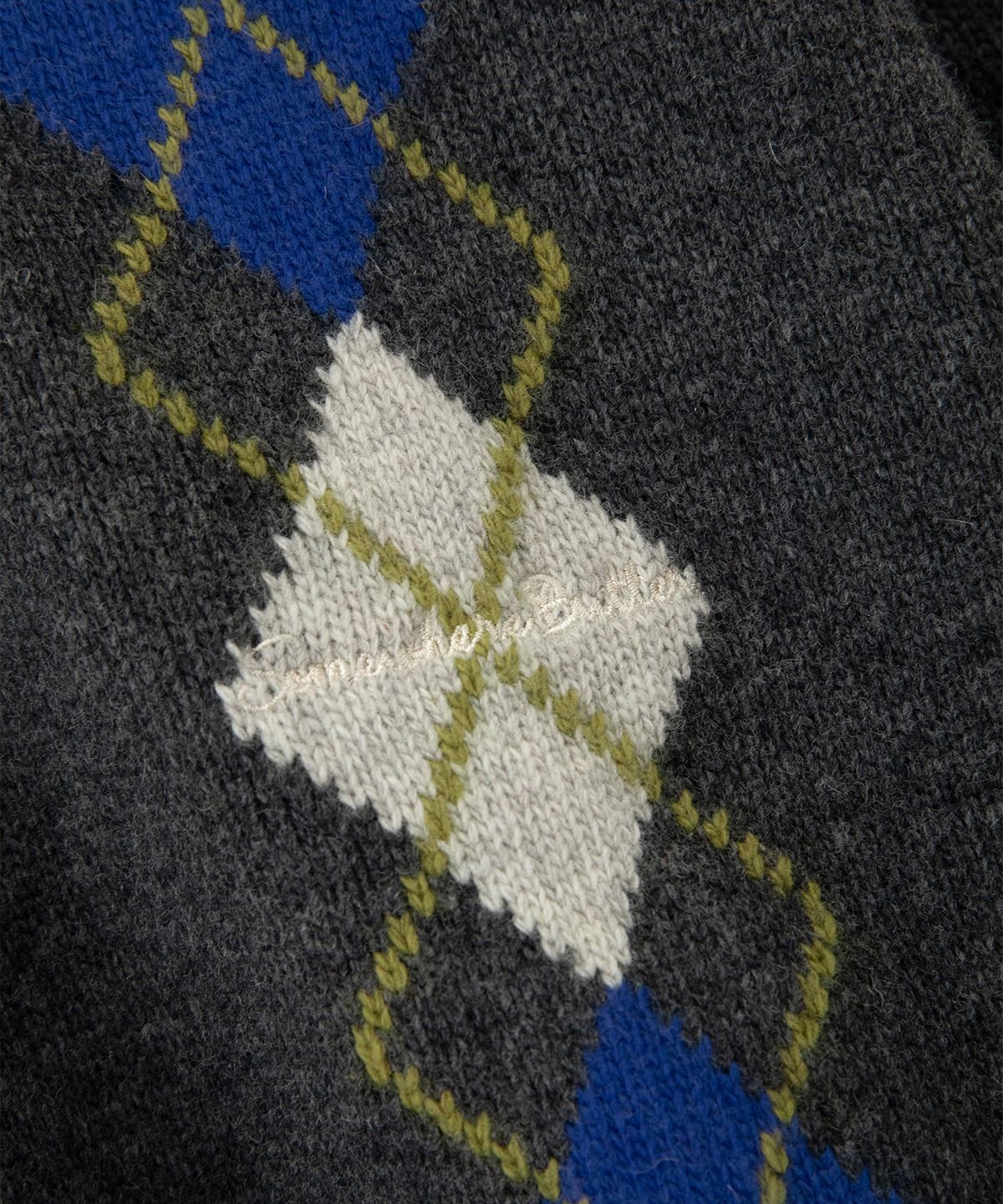 썸웨어버터(SOMEWHEREBUTTER) Noelle Argyle Knit - Charcoal