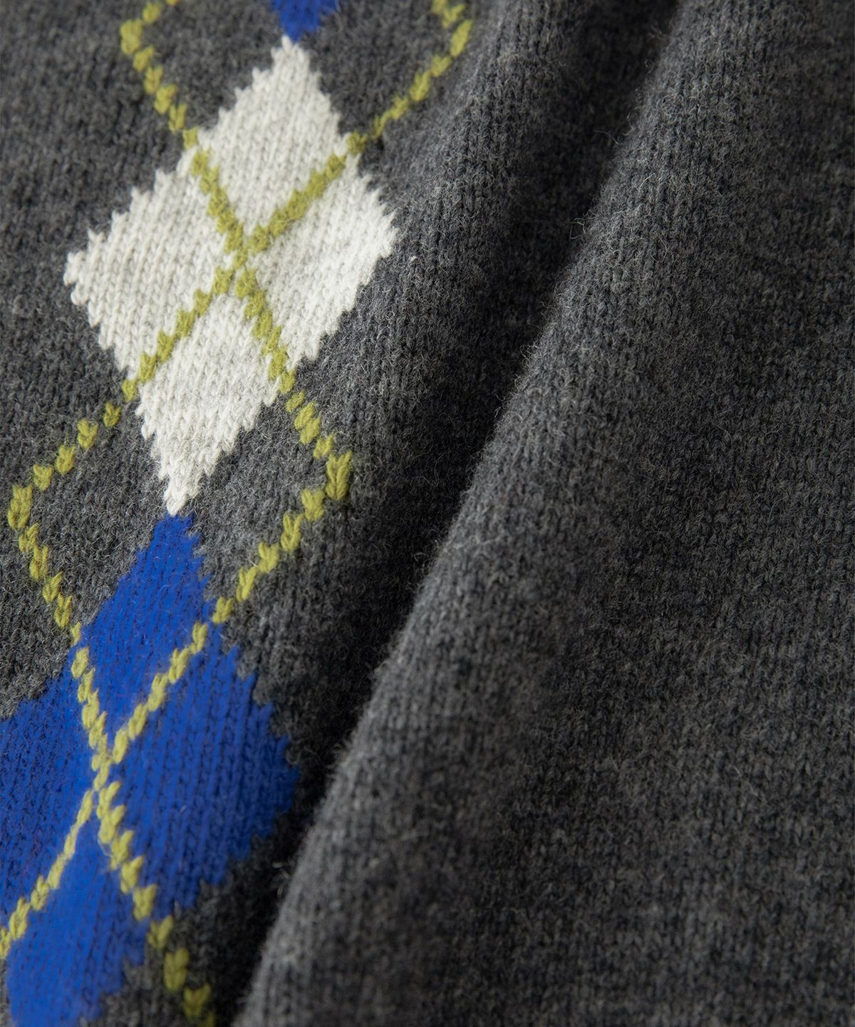 썸웨어버터(SOMEWHEREBUTTER) Noelle Argyle Knit - Charcoal