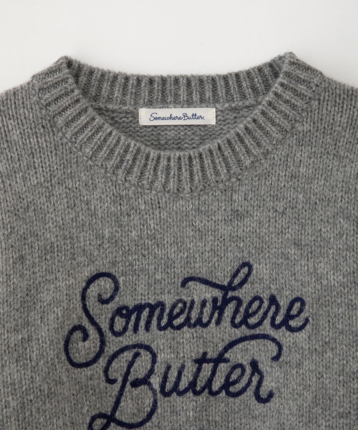 썸웨어버터(SOMEWHEREBUTTER) Boucle Heart Wool Knit - Grey