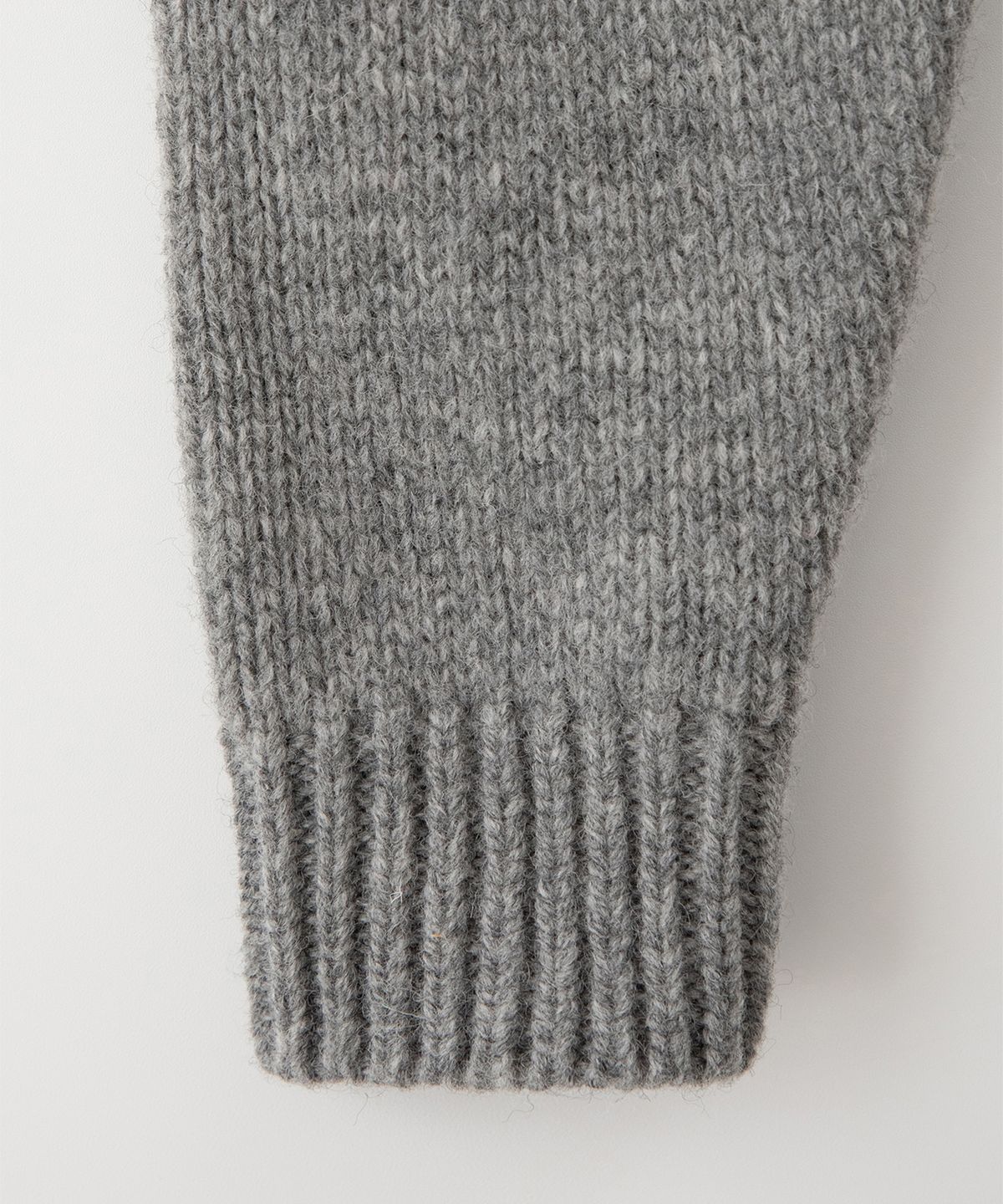 썸웨어버터(SOMEWHEREBUTTER) Boucle Heart Wool Knit - Grey