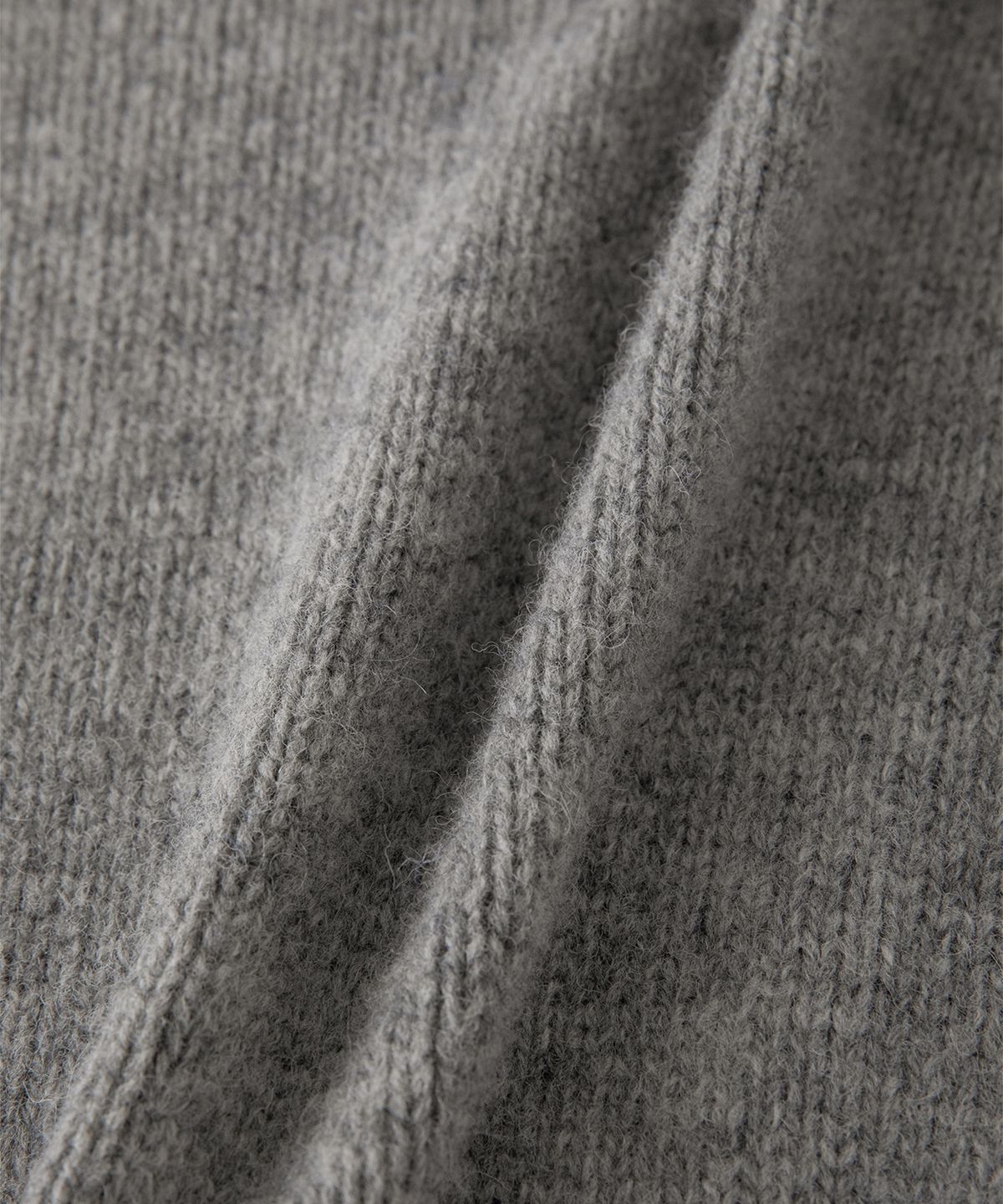썸웨어버터(SOMEWHEREBUTTER) Boucle Heart Wool Knit - Grey
