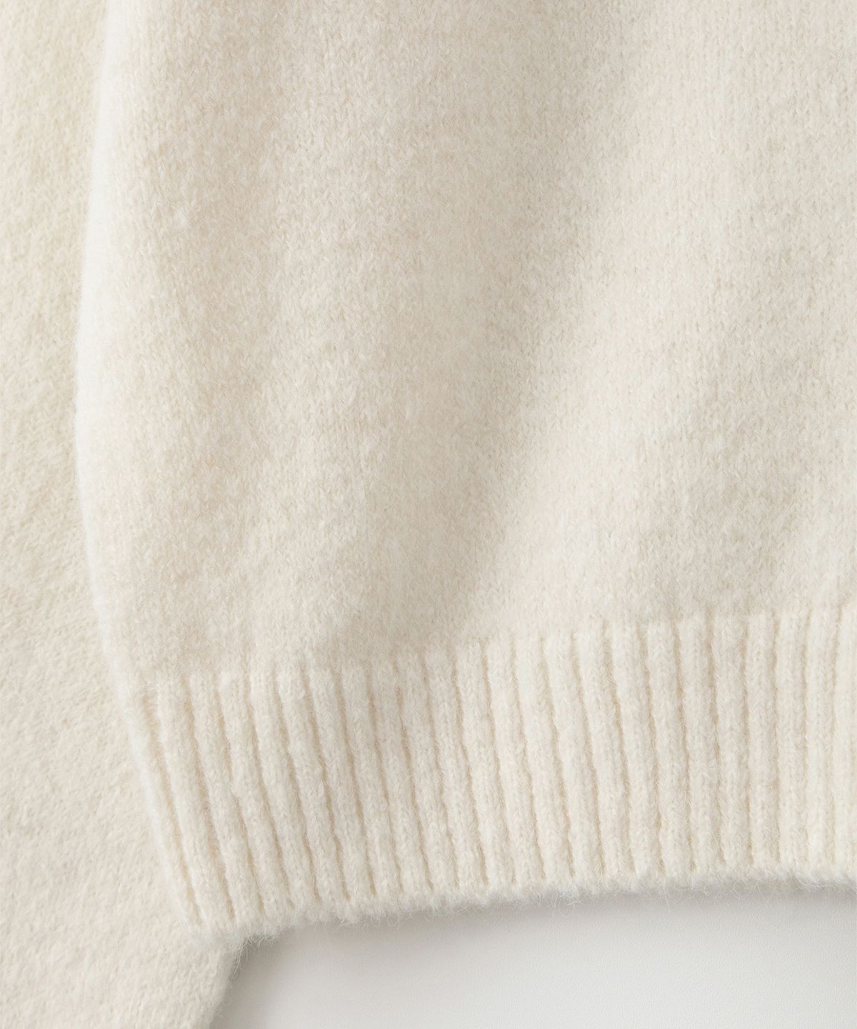 썸웨어버터(SOMEWHEREBUTTER) Manon Alpaca Cardigan - Ivory