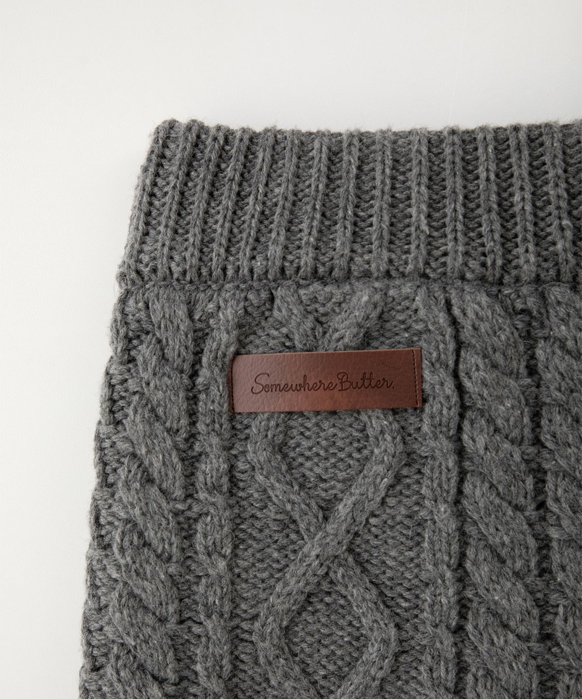 썸웨어버터(SOMEWHEREBUTTER) Wool Cable Knit Pants - Grey