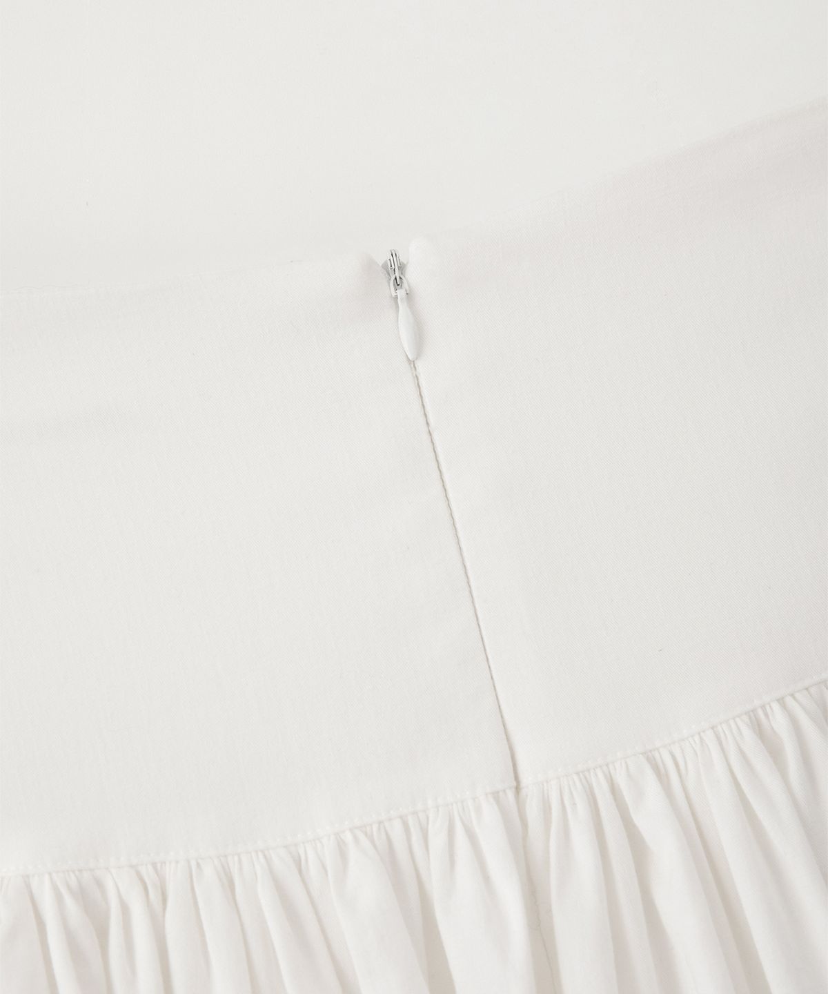 썸웨어버터(SOMEWHEREBUTTER) Button Shirring Long Skirt - Ivory