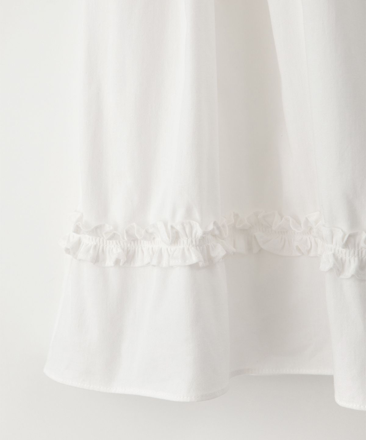 썸웨어버터(SOMEWHEREBUTTER) Button Shirring Long Skirt - Ivory