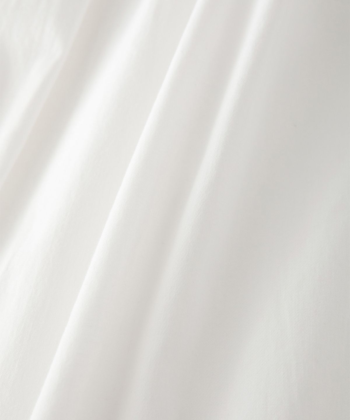 썸웨어버터(SOMEWHEREBUTTER) Button Shirring Long Skirt - Ivory
