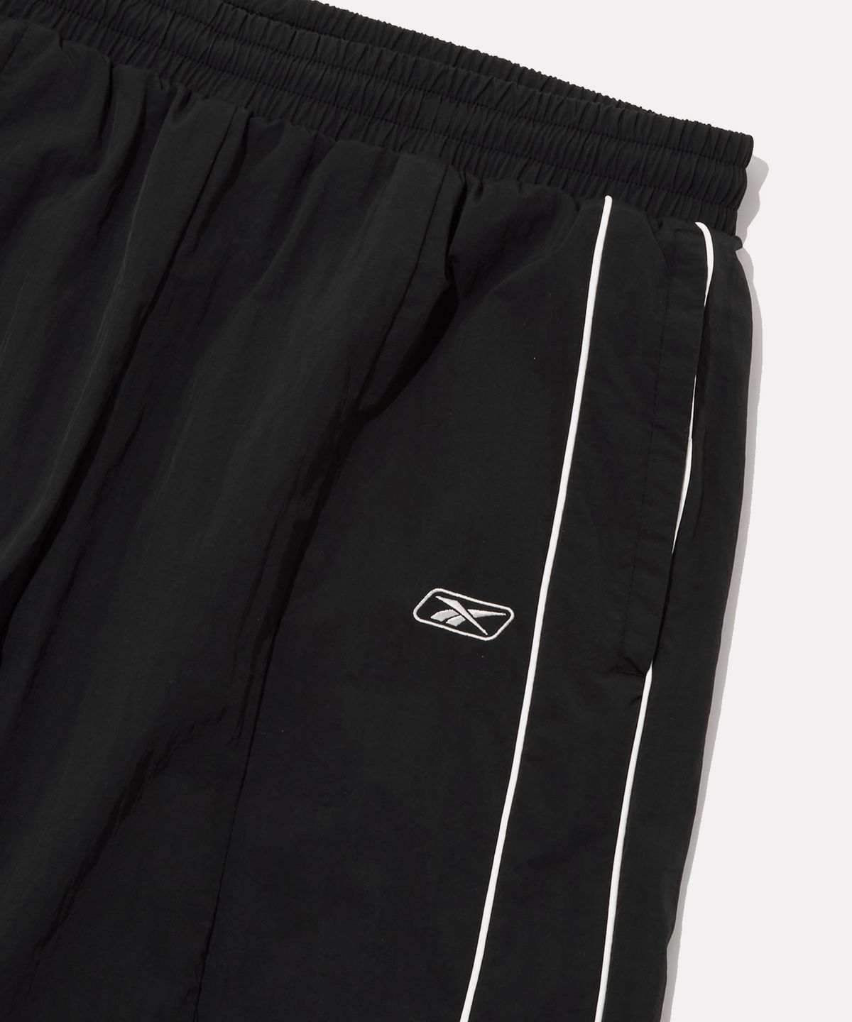 리복(REEBOK) 프리미어 웜업 팬츠 (W) - 블랙