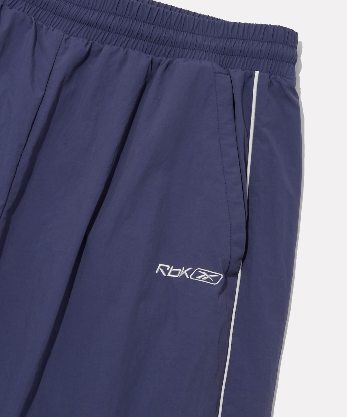 리복(REEBOK) 프리미어 웜업 팬츠 - 더스티 네이비
