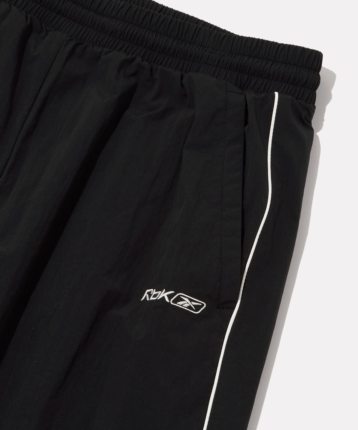 리복(REEBOK) 프리미어 웜업 팬츠 - 블랙