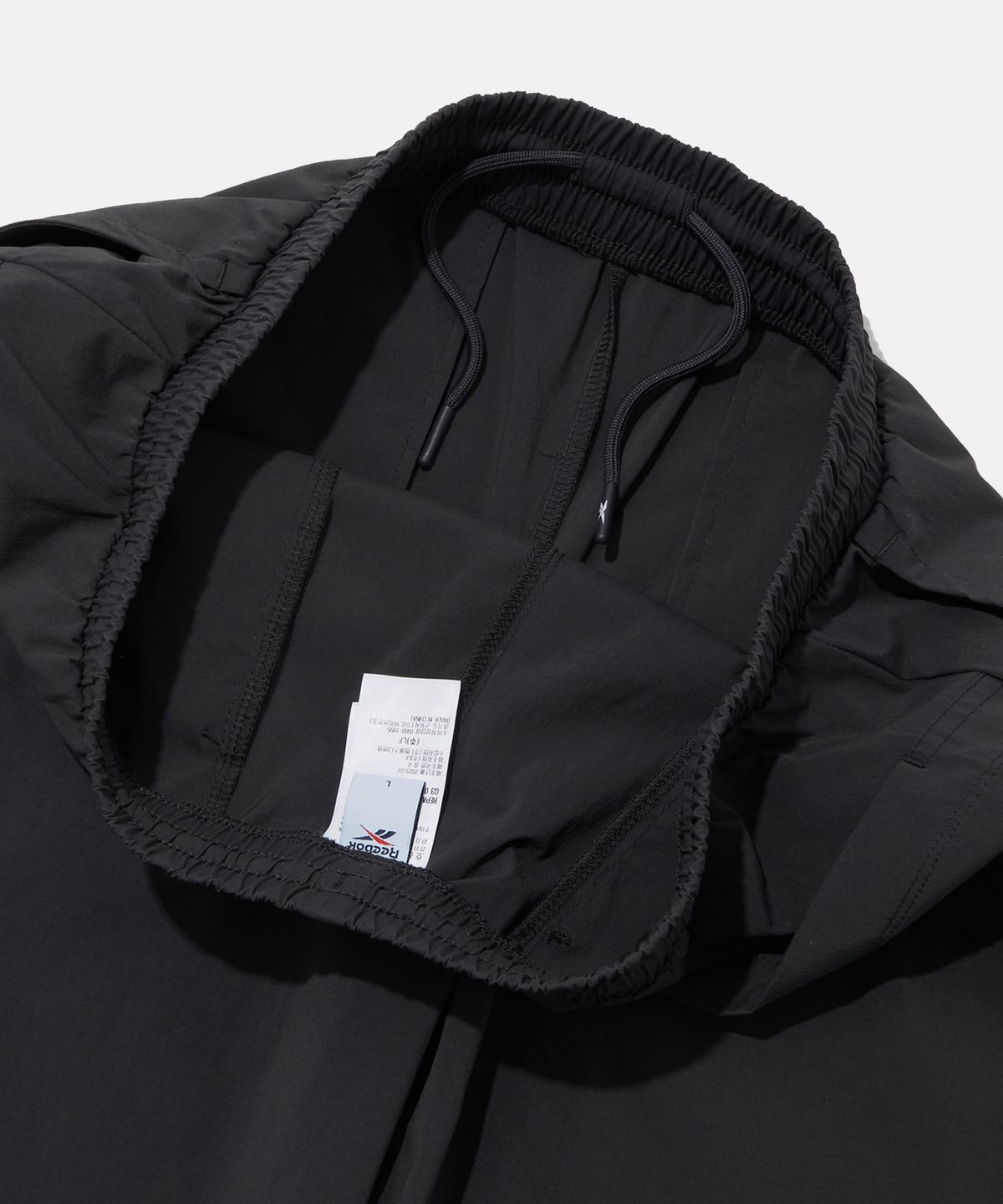 리복(REEBOK) 나일론 스트레치 카고 조거 팬츠 - 차콜