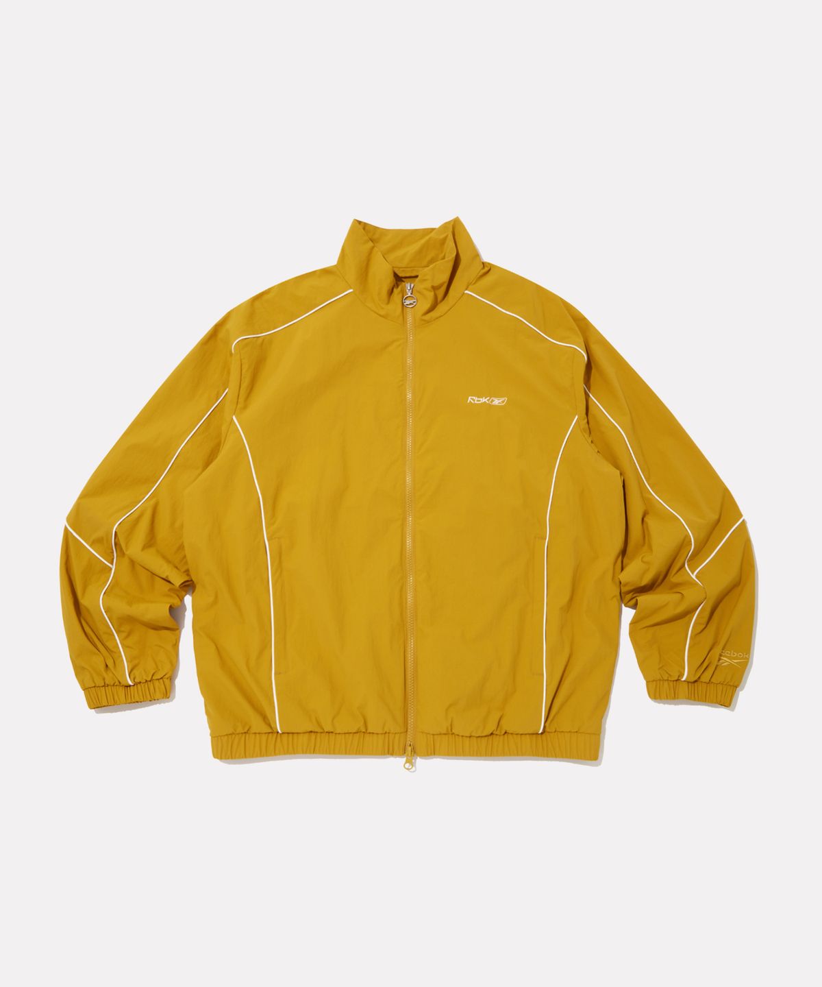 리복(REEBOK) 프리미어 윈드 브레이커 - 머스타드