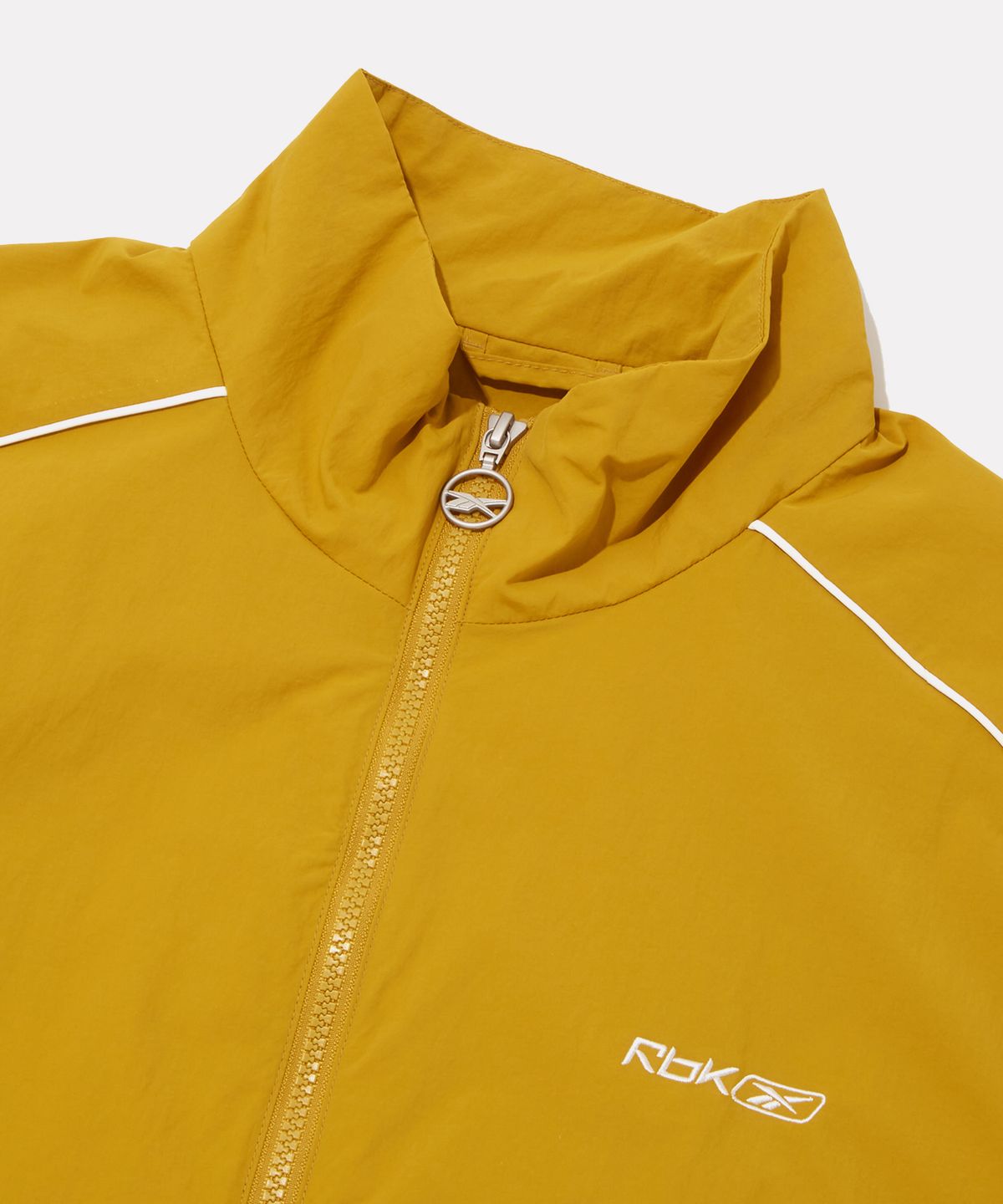 리복(REEBOK) 프리미어 윈드 브레이커 - 머스타드