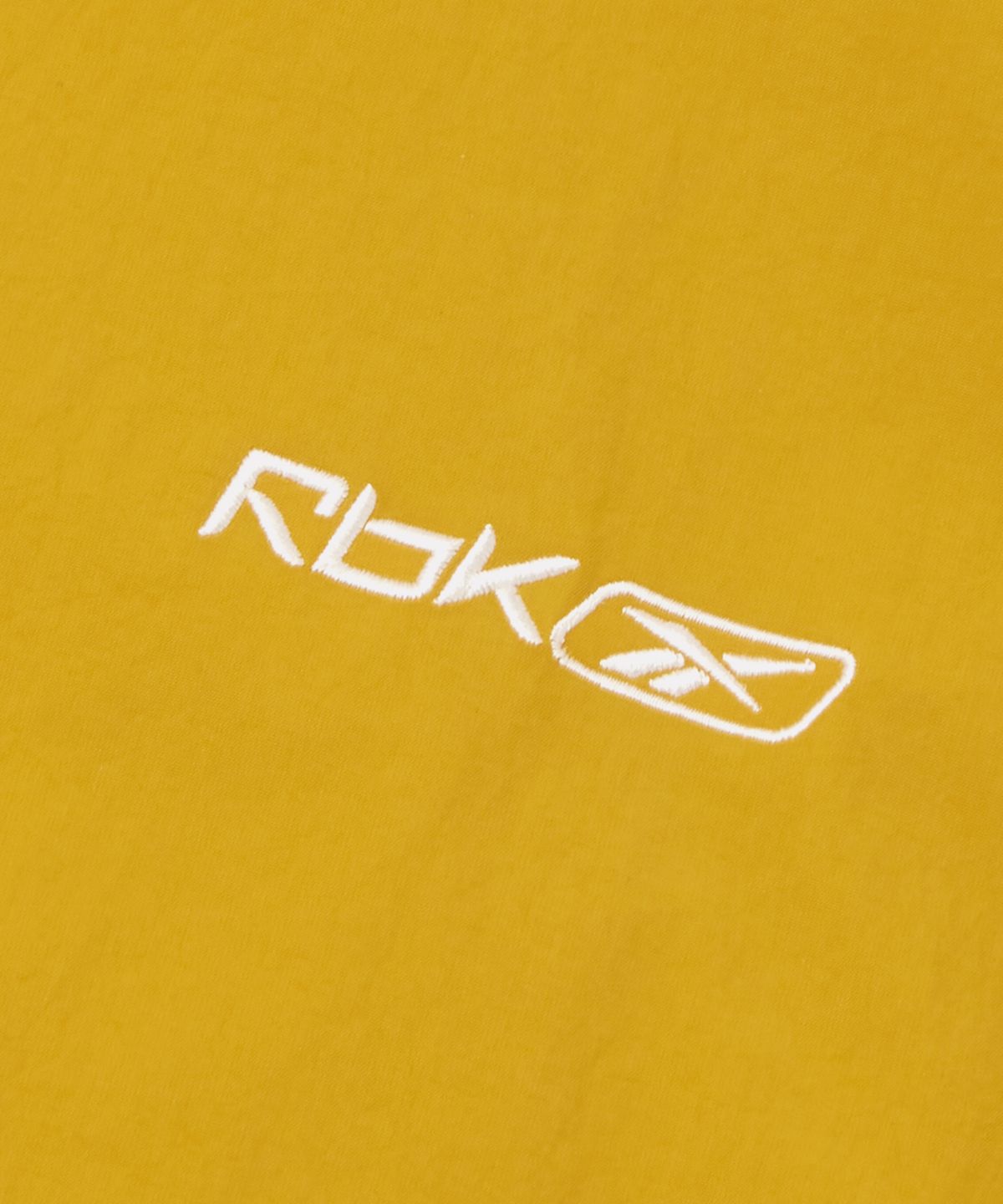 리복(REEBOK) 프리미어 윈드 브레이커 - 머스타드