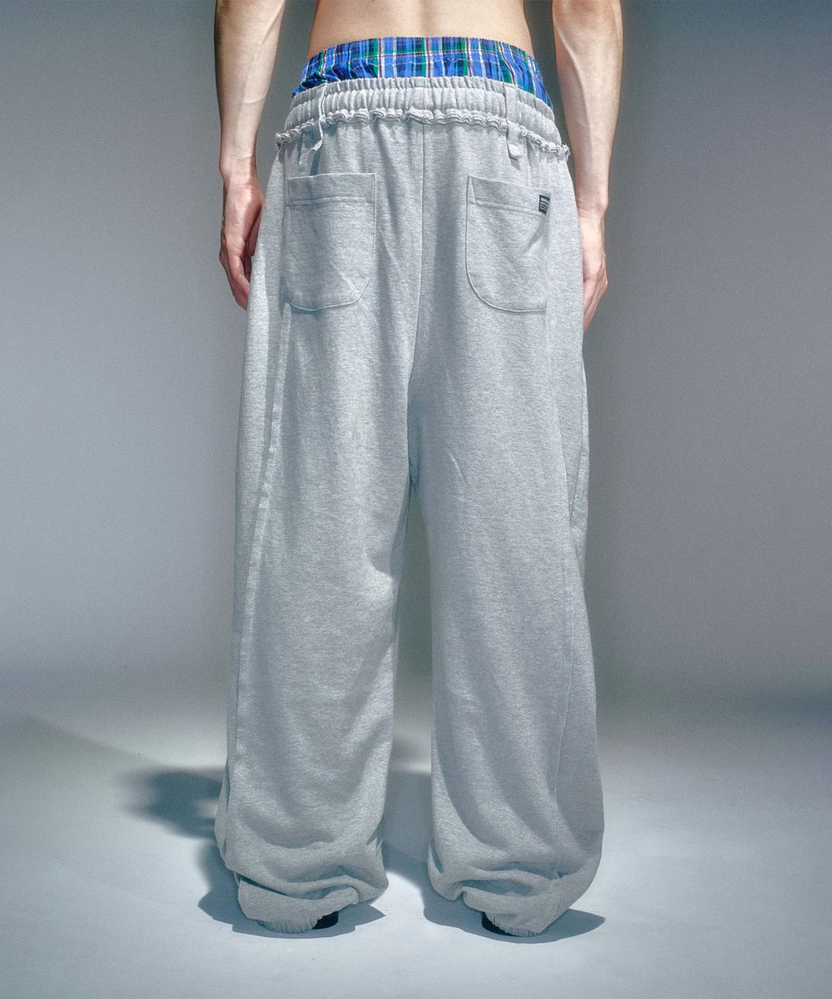 베이컨트 아카이브(VACANT ARCHIVE) MEN JOAN SEAMLINE TRACK JOGGERS MELANGE