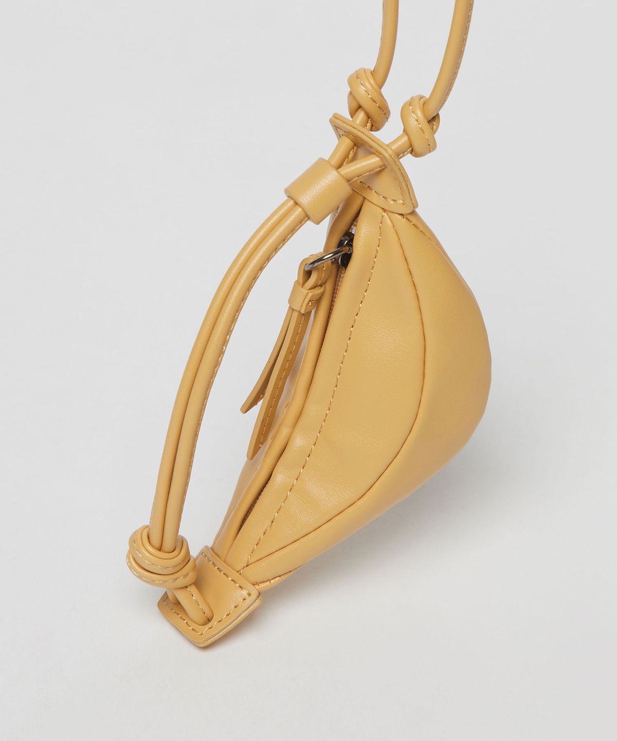 아카이브앱크(ARCHIVEPKE) Mini fling keyring bag(Butter)_OVAAX25201MUS