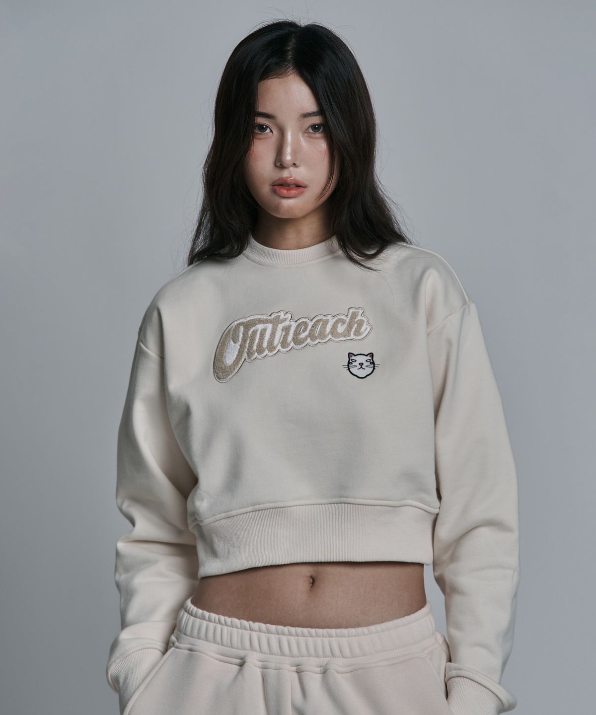 제이엘브(JELEVE) 우먼스 아웃리치 캣 크롭 스웨트셔츠