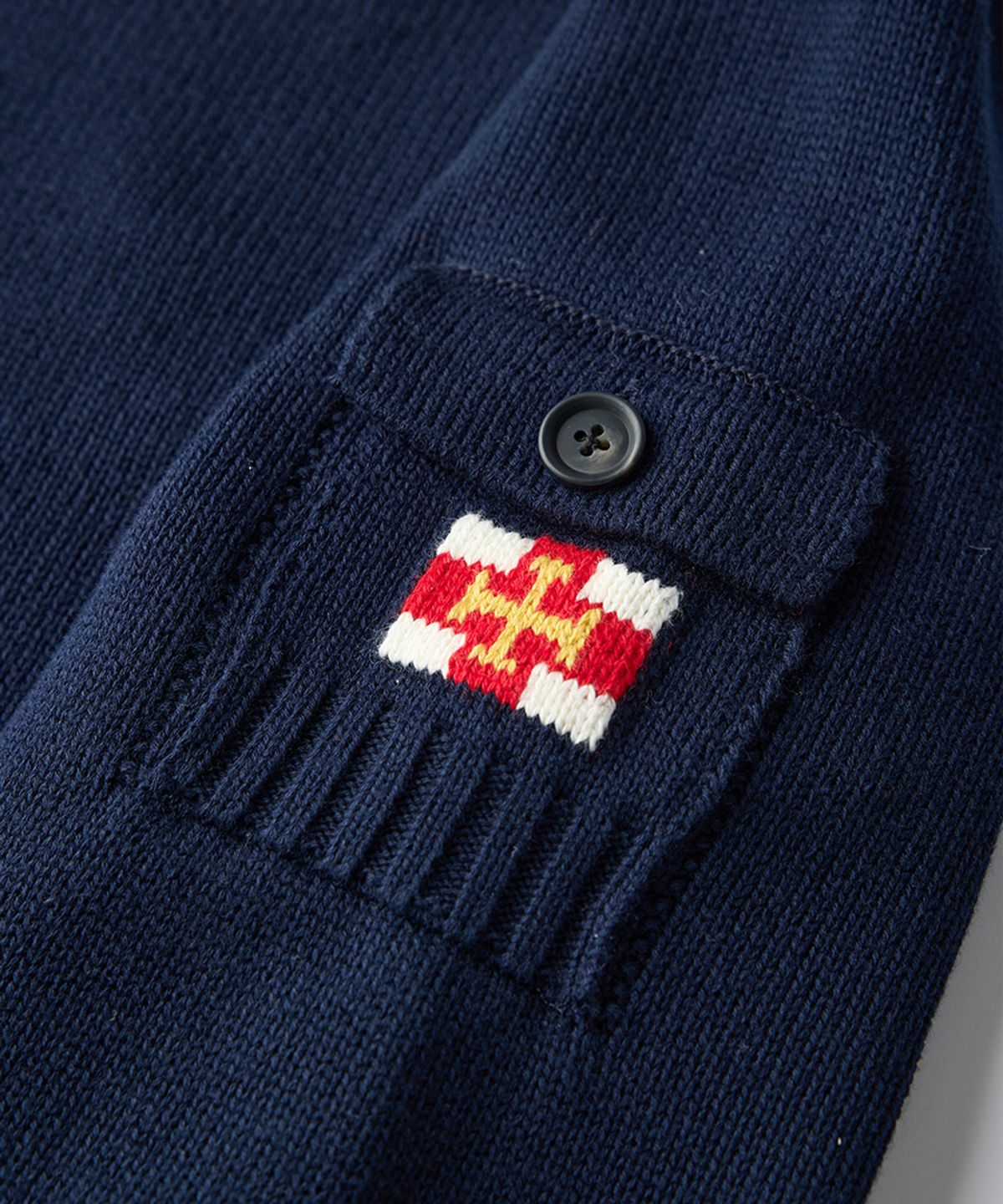 건지 울른스(Guernsey Woollens) 코튼 나그랑 포켓 스웨터 - 네이비