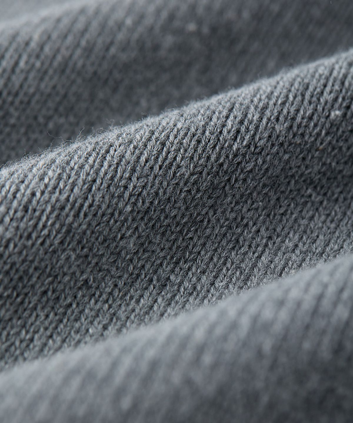건지 울른스(Guernsey Woollens) 코튼 나그랑 포켓 스웨터 - 멜란지 그레이