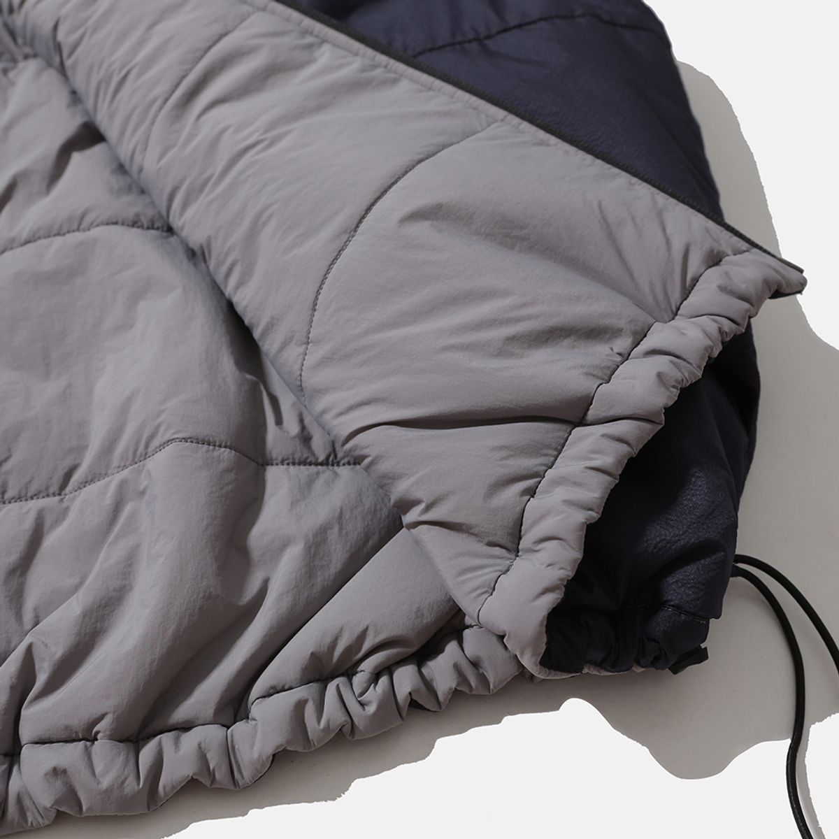 모이프(MOIF) [AW25] REVERSIBLE PUFF VEST / CLOUD GRAY/NAVY
